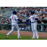 Knoxville Smokies third baseman BJ Murray, Jr. (right) greets shortstop Jaylen Palmer